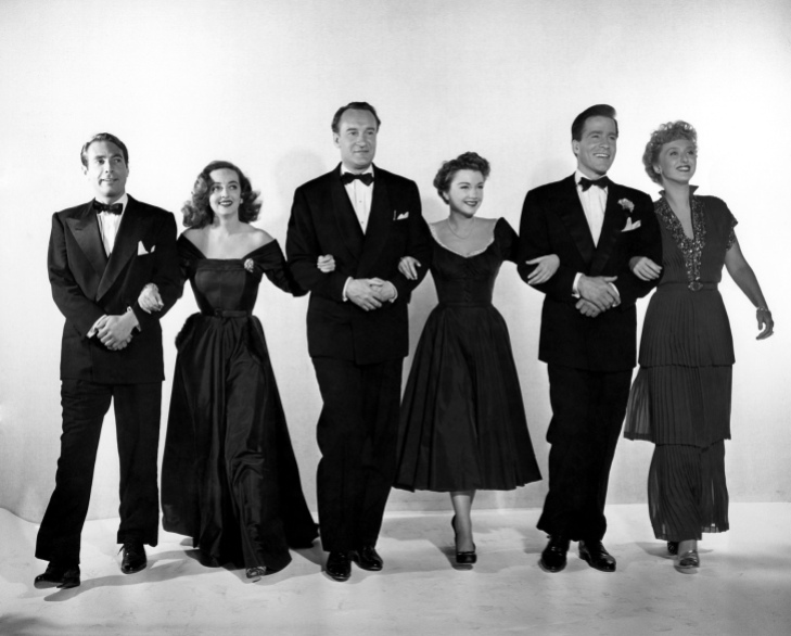 A publicity still from the 1950 Academy Award®-winning drama "All about Eve" features (left to right): Gary Merrill, Bette Davis, George Sanders, Anne Baxter, Hugh Marlowe and Celeste Holm. "All about Eve" received a record 14 Academy Award nominations and won six Oscars®, including Best Picture. Restored by Nick & jane for Dr. Macro's High Quality Movie Scans Website: http:www.doctormacro.com. Enjoy!